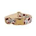 Red cherry printed dog collar with light gold buckle and matching leash set with bow accessory