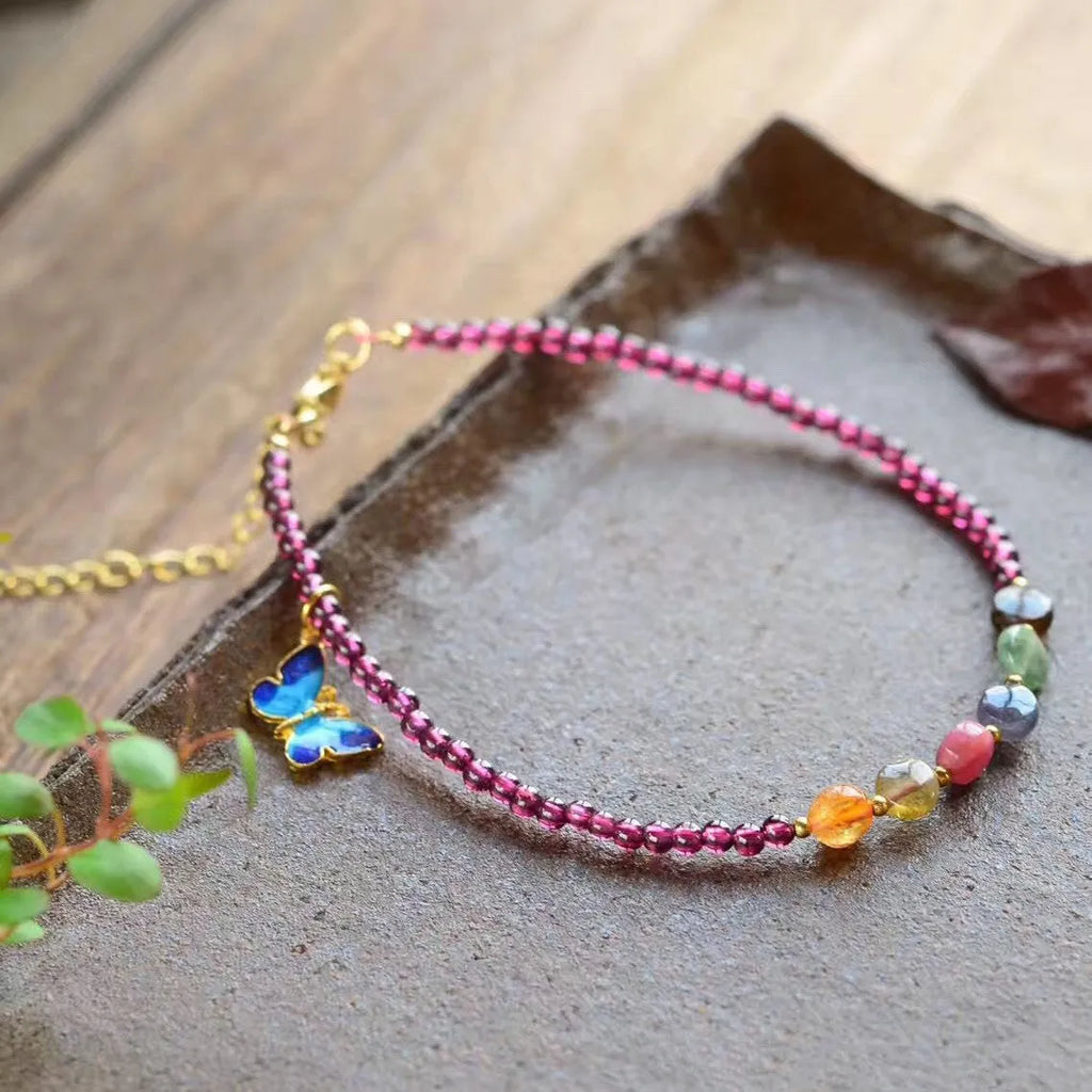 Purple garnet stone women's anklet with ethnic geometric design on ankle