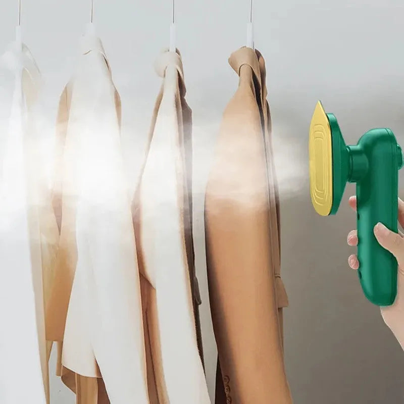 Dark green portable hand-held steam ironing machine with a ceramic panel.