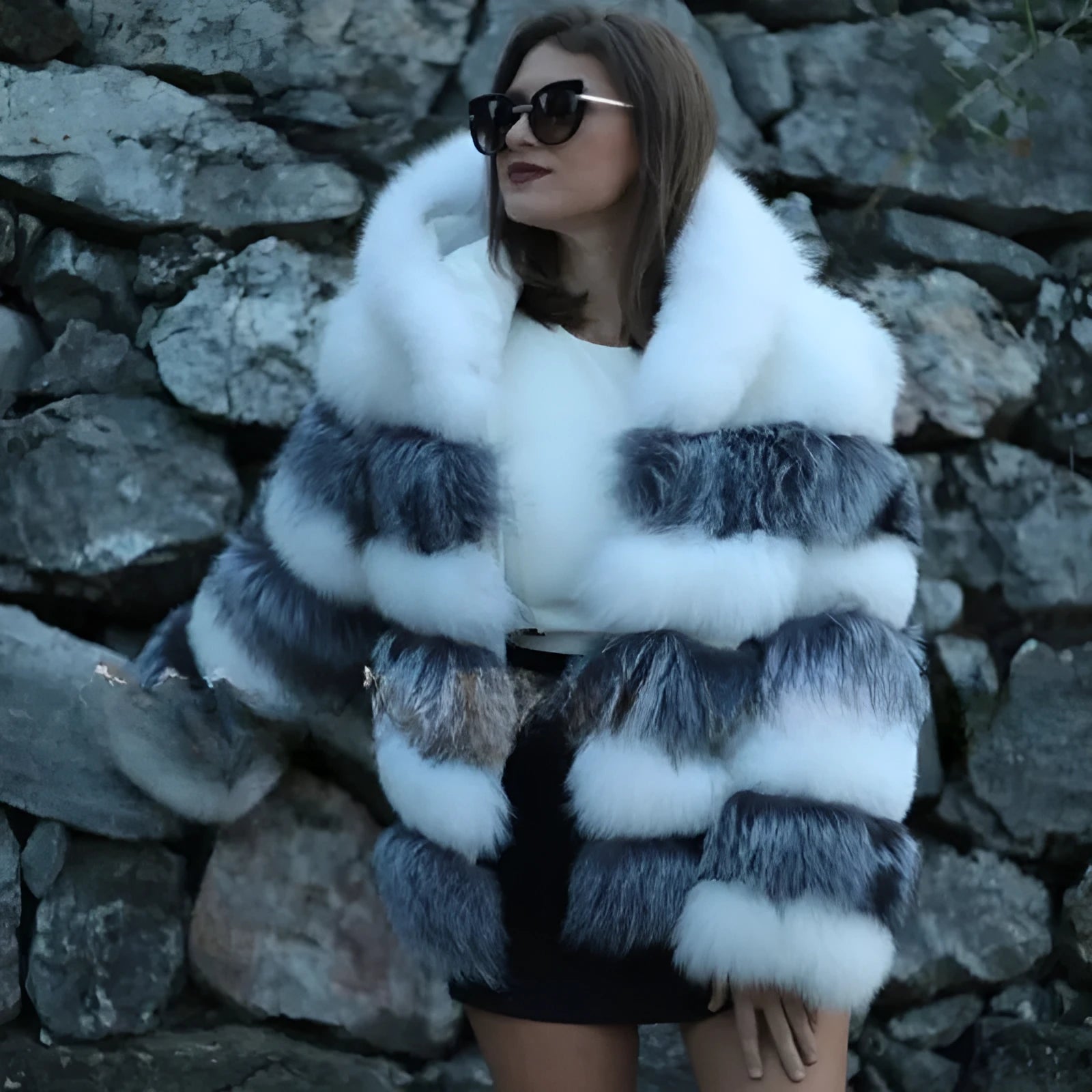 Women's loose-fit artificial fur hooded coat in street fashion style, shown in brown colour.