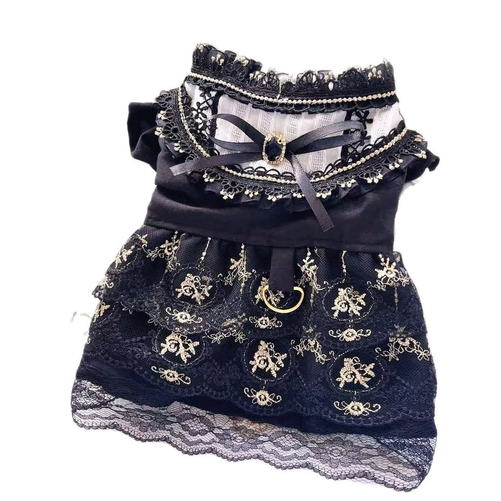 Golden gothic princess skirt costume on a small dog, showing the pet clothing design.