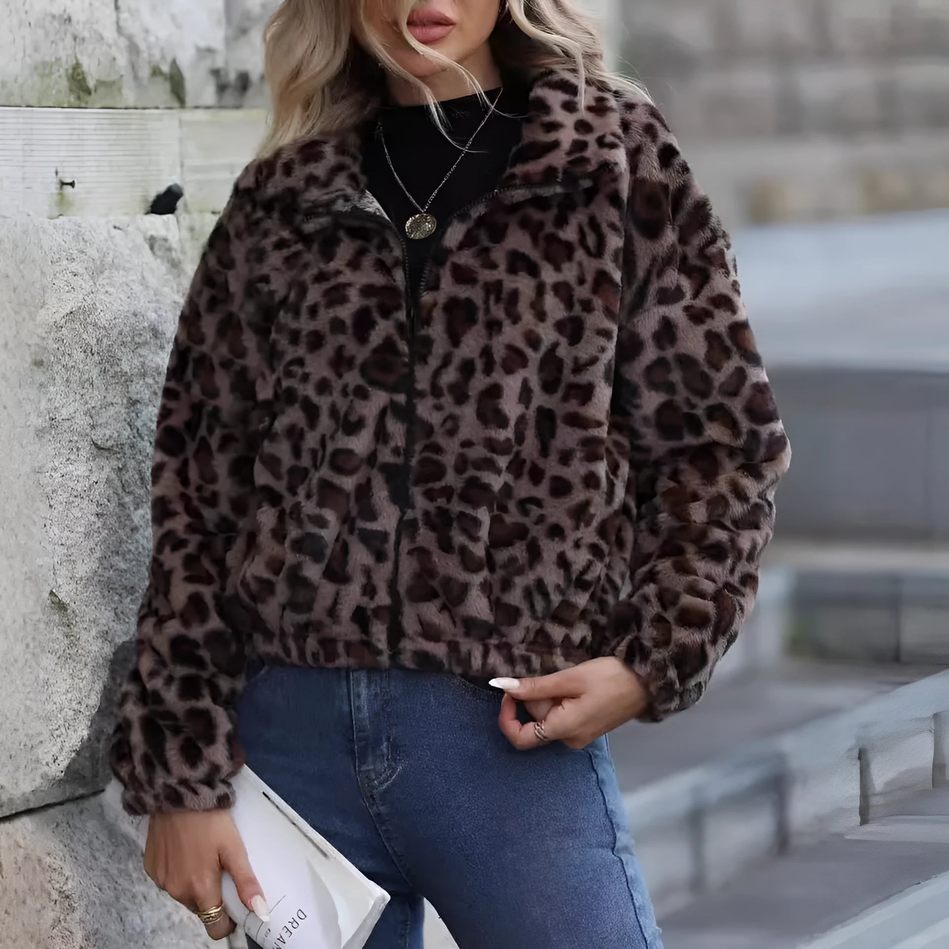 Women's loose leopard print plush coat with zip front and raglan sleeves.