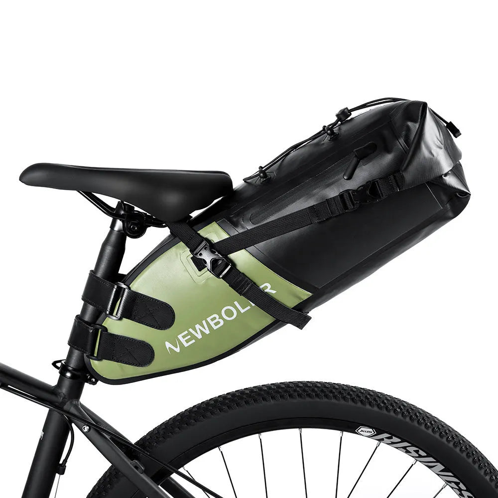 Yellow waterproof PVC bicycle tail bag mounted on a bike rear rack.