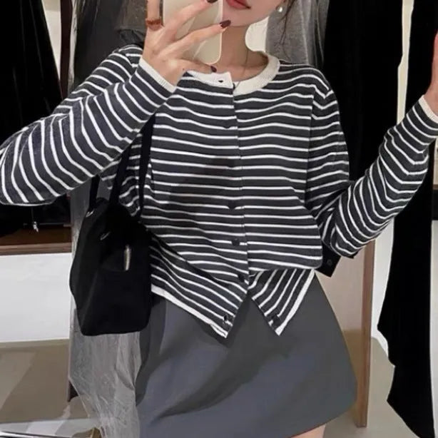 Dark grey and white striped women's cardigan coat with slim fit and short length.