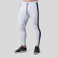 Men's polyester fitness training pants in green, black, navy blue and grey colours for gym workout and bodybuilding