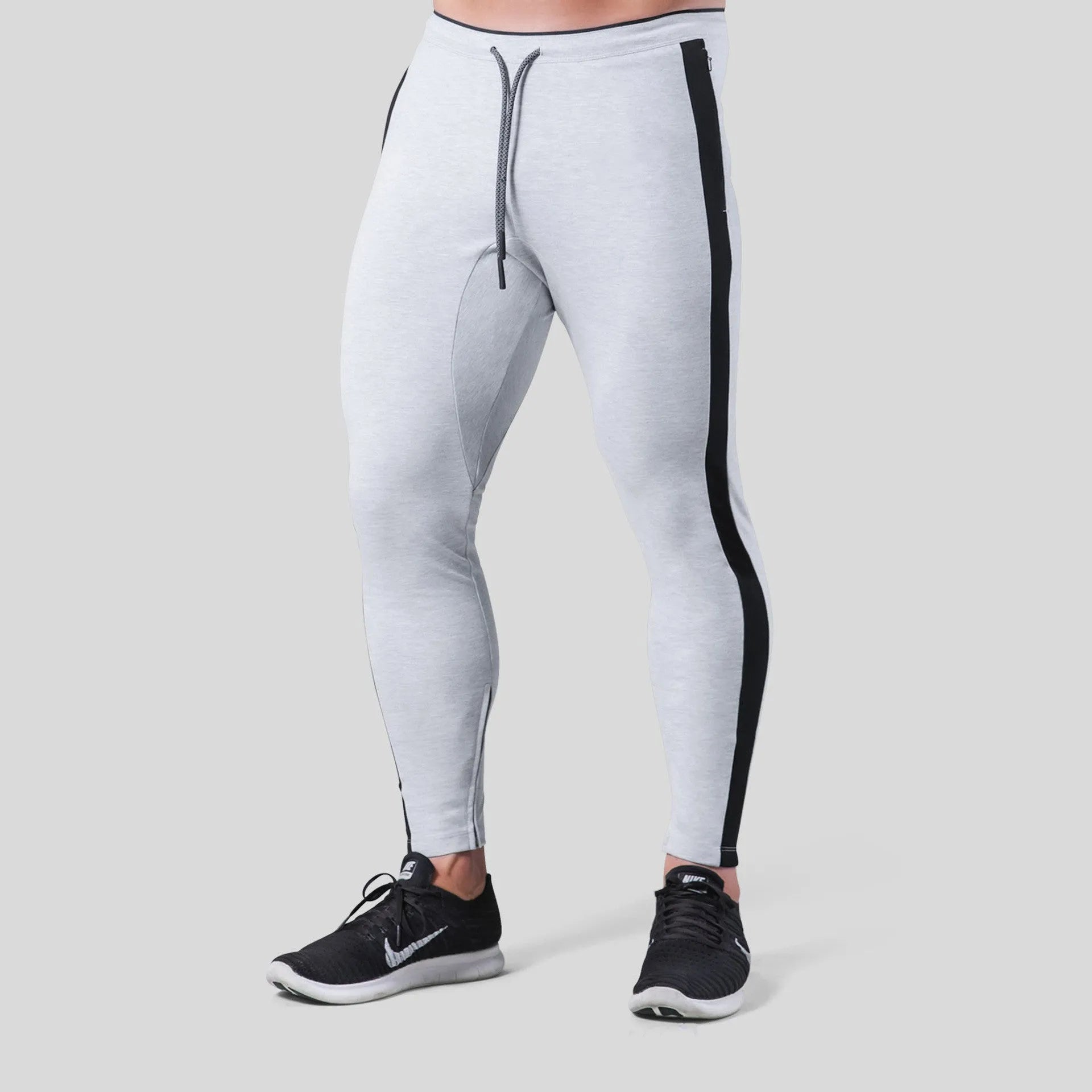 Men's polyester fitness training pants in green, black, navy blue and grey colours for gym workout and bodybuilding