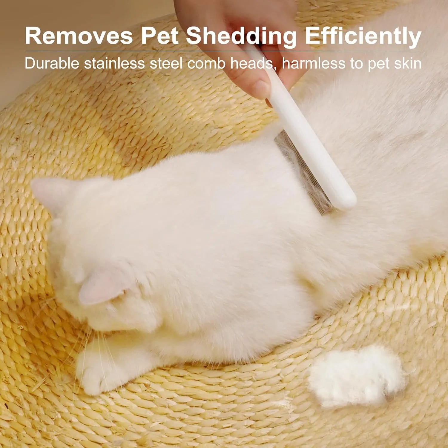 Green and white stainless steel cat comb with rounded teeth for grooming and flea removal