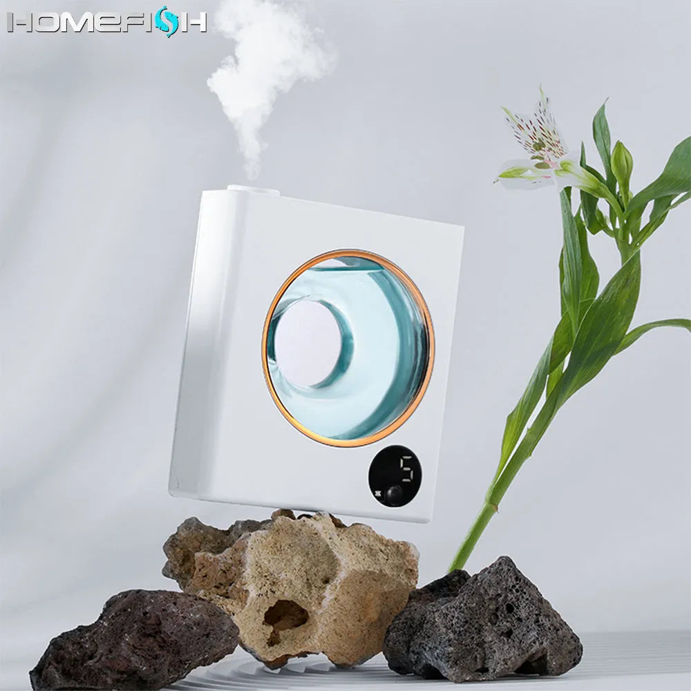 Small white wall mounted automatic aromatherapy machine with USB charging port.