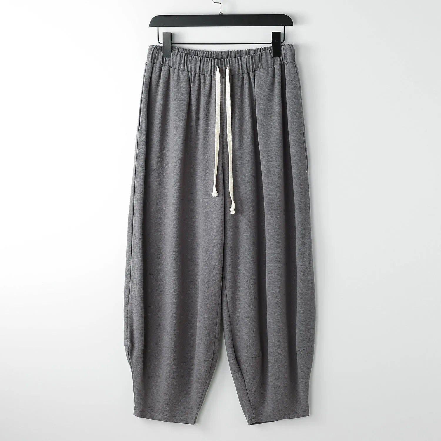 Men's linen harem pants with tapered legs and ankle tie closure in multiple colour options