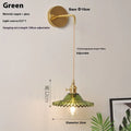 Retro brass copper wall lamp with a transparent glass lotus shade in a choice of six colours.