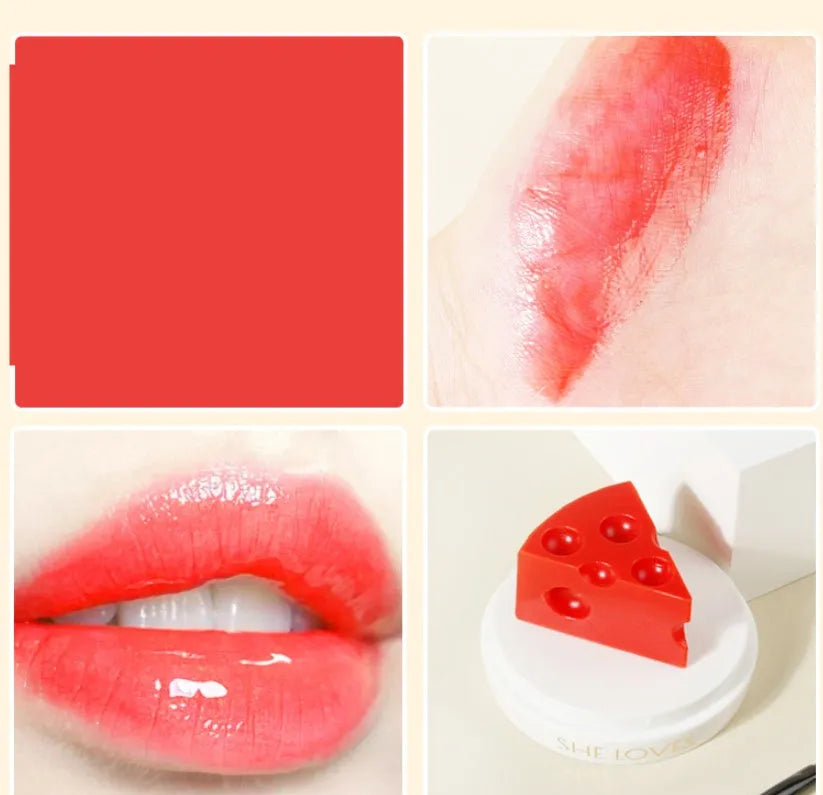 Pink cheese-shaped lip balm with Vitamin E and cream scent in open case with brush applicator