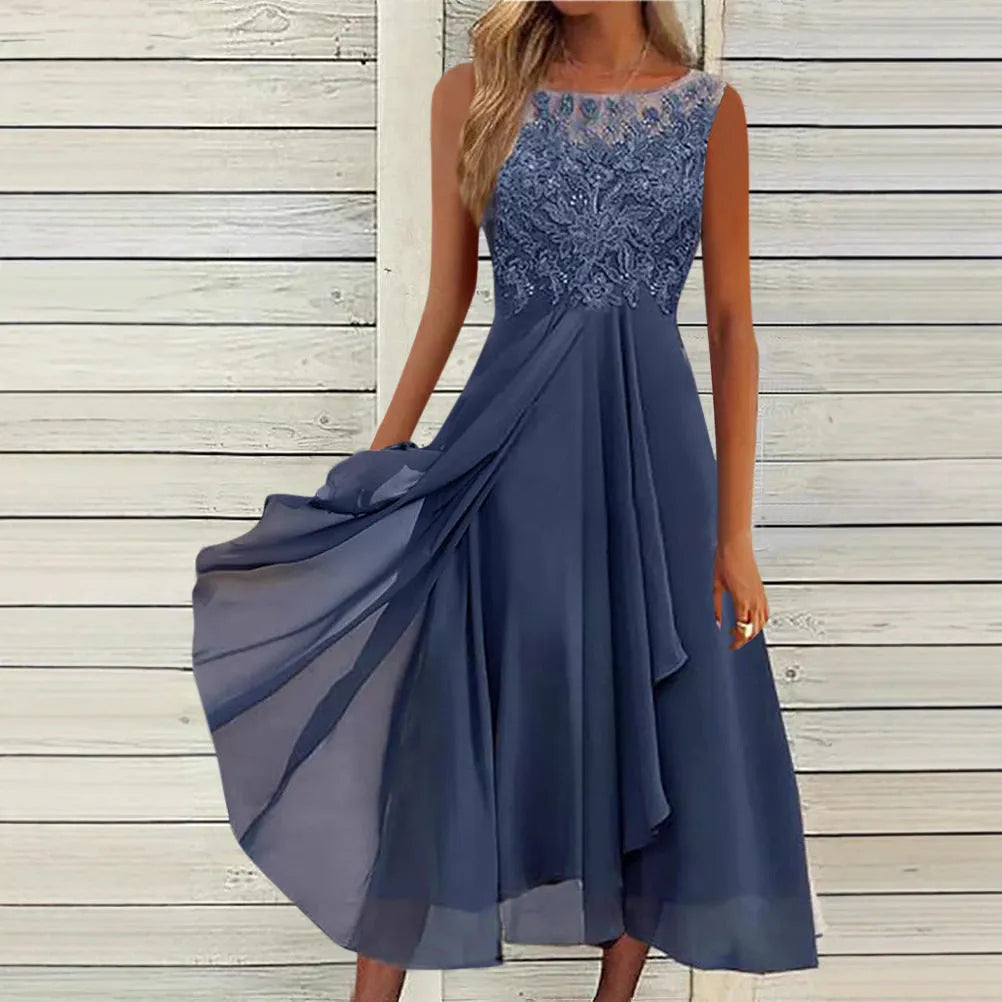 Women's sleeveless green chiffon dress with lace hollow-out detailing on a mannequin.