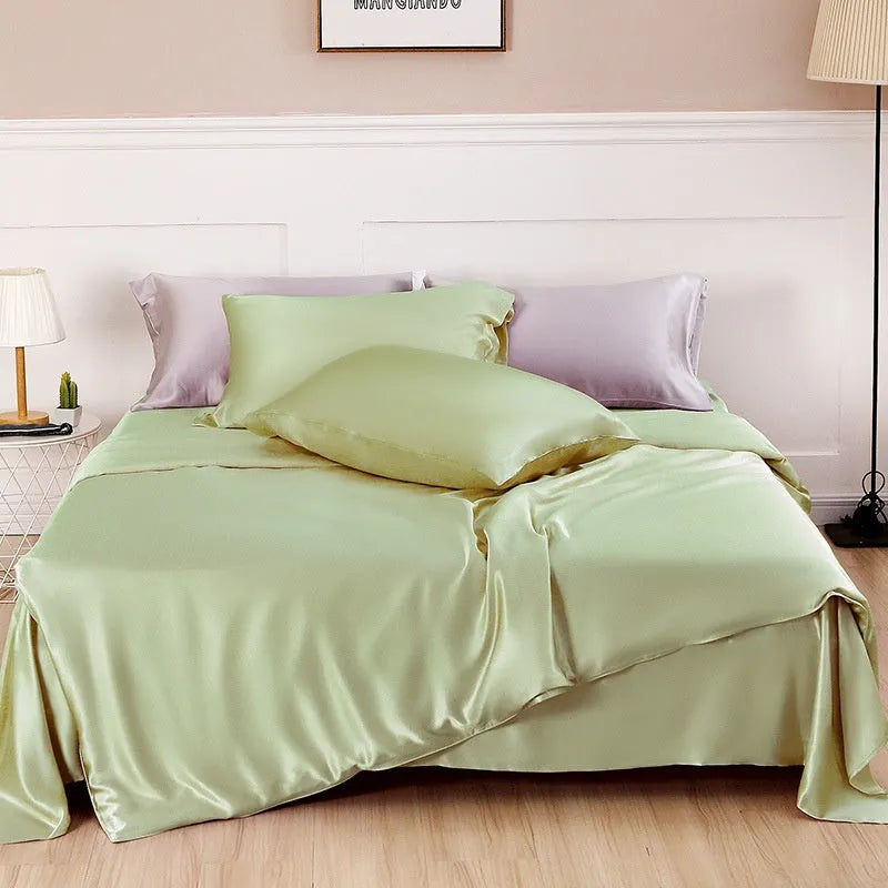 Double-sided silk duvet cover showing Lotus Pink, pea green, bright brown, mysterious purple, white, and silver blue colour options