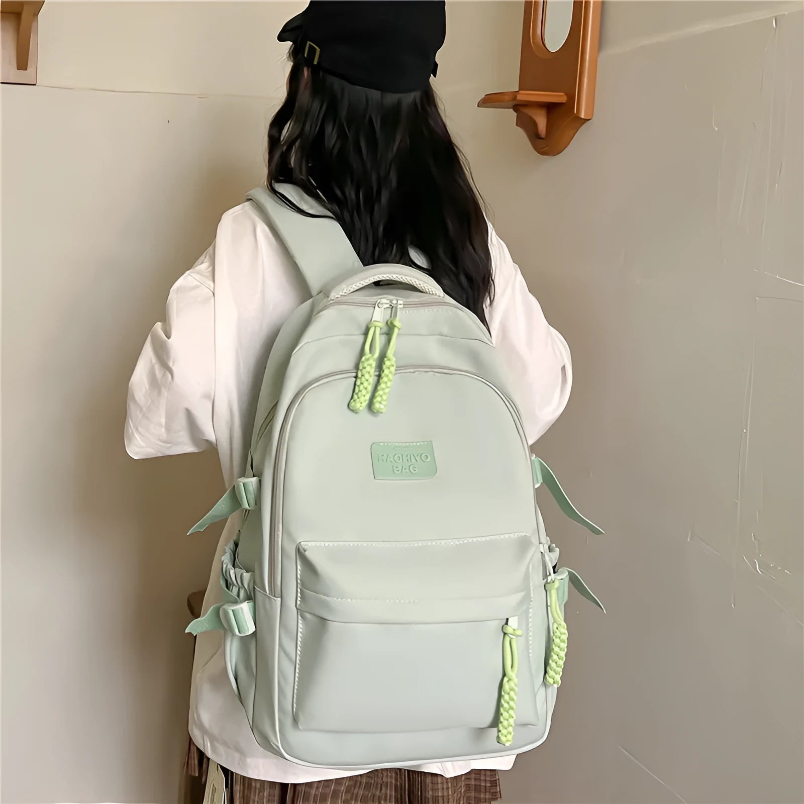 Korean-style lightweight waterproof nylon backpack for primary school students in macaron colour with curved shoulder strap, 20-35L capacity