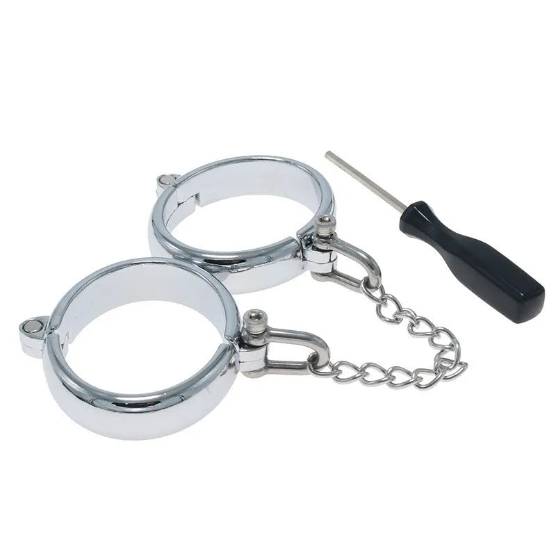 Polished silver handcuffs and footcuffs set with stainless steel components for adult role play accessories