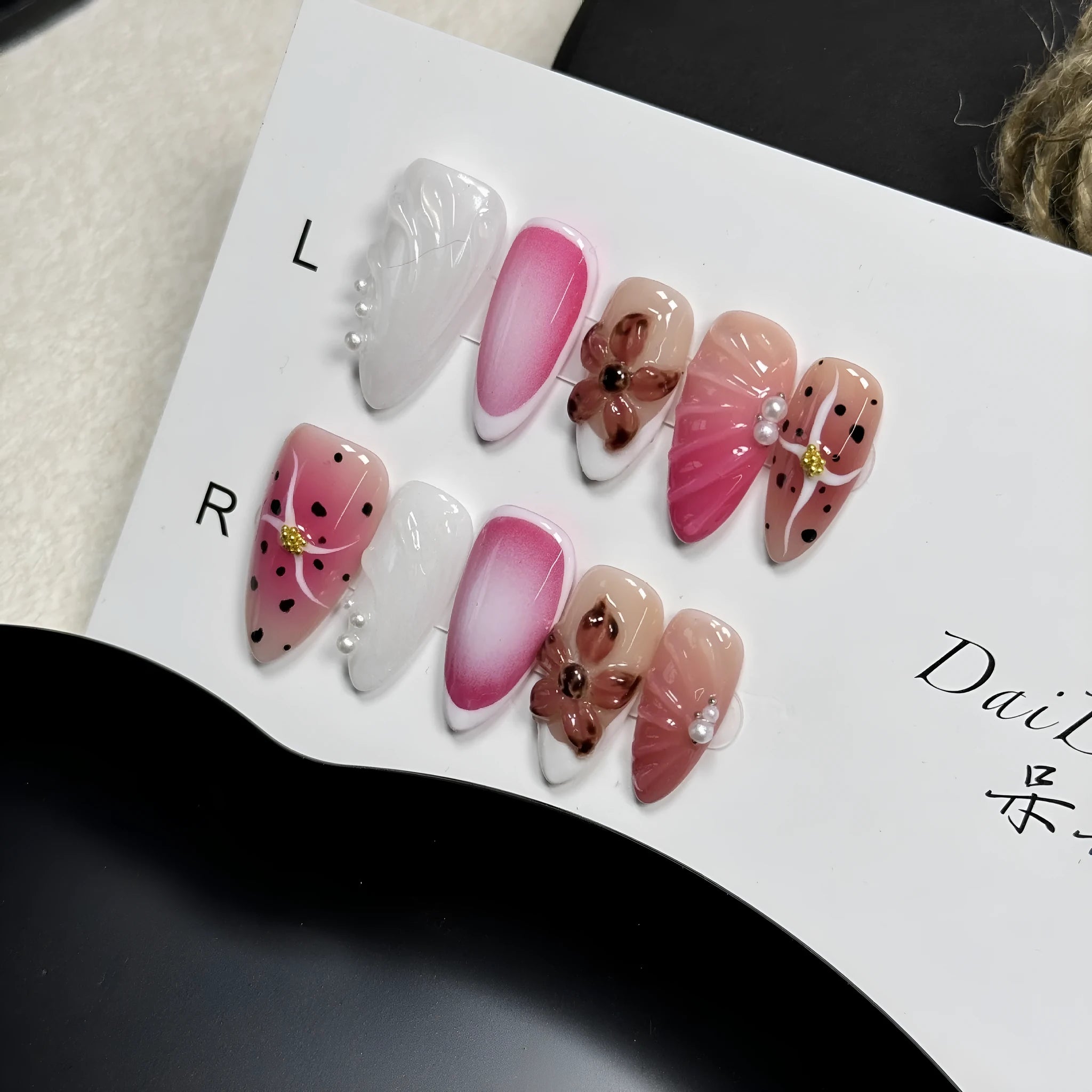 Hand-painted three-dimensional carved nail patches with embossed candy design in multiple colours