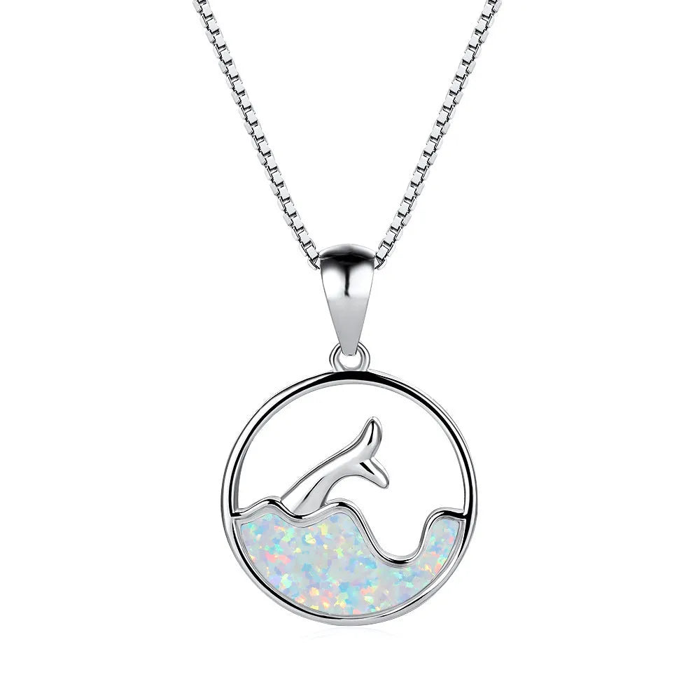 White gold plated fishtail pendant necklace with round blue opal stone on a 45 cm chain.