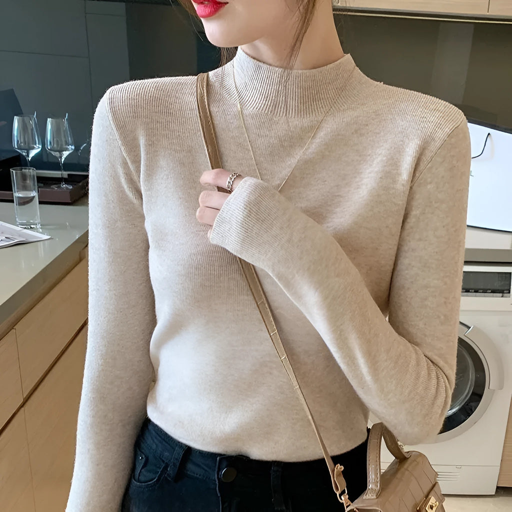 Slim fit viscose inner knitted shirt in apricot colour with long sleeves.