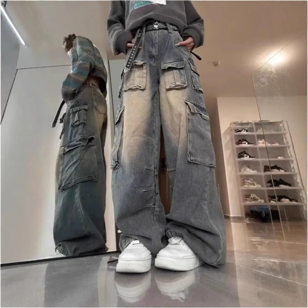 Men's loose fit distressed denim jeans with multiple pockets in light blue or black colours
