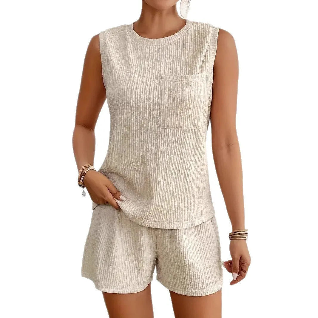 Women's apricot sleeveless vest and shorts co-ord set laid flat.