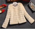 Women's short sleeve faux fur top in rabbit fur look, available in beige, black, and white.
