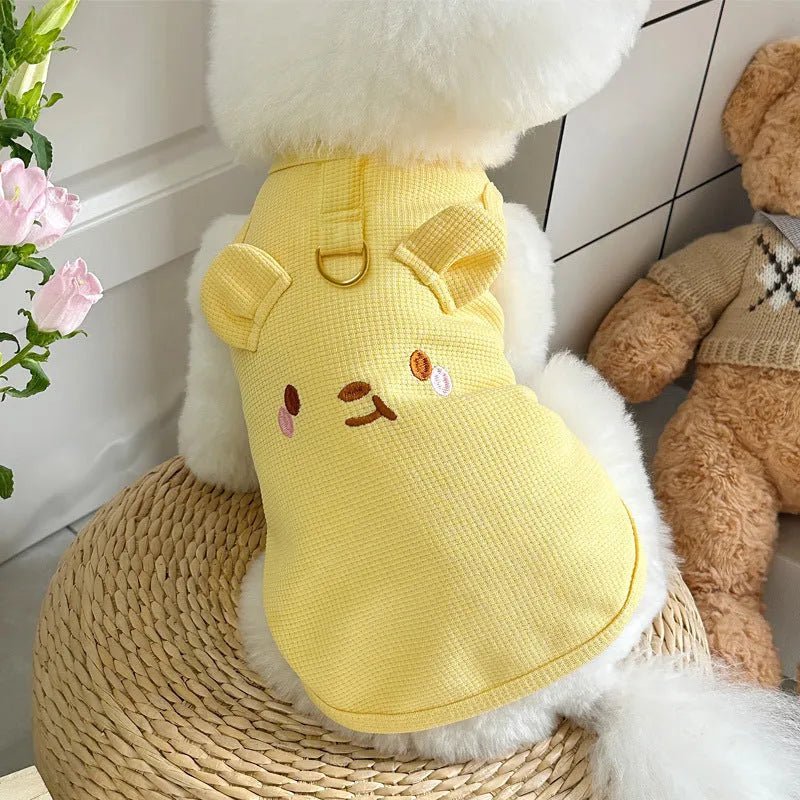 Yellow waffle weave dog vest on a mannequin showing casual style and sizing.