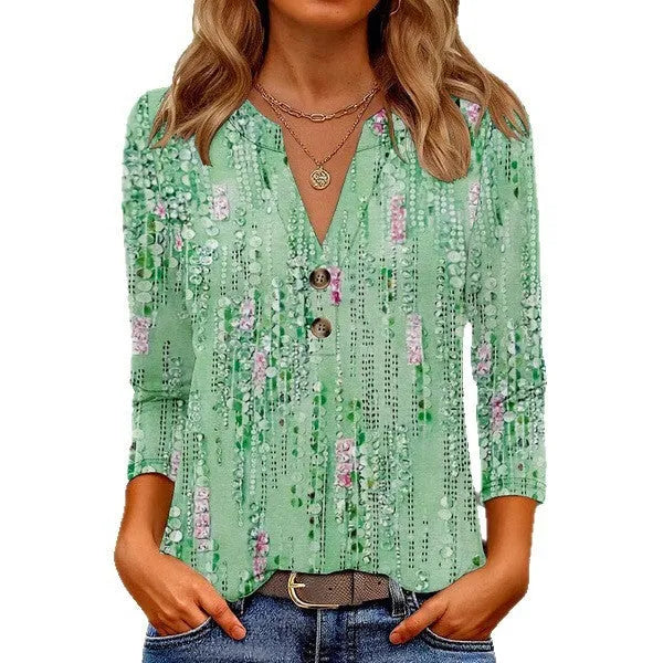 Women's loose fit V-neck t-shirt with a colourful 3D printed pattern on the front.