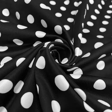 Women's multicolour polka dot pleated dress with a square collar and zip front.
