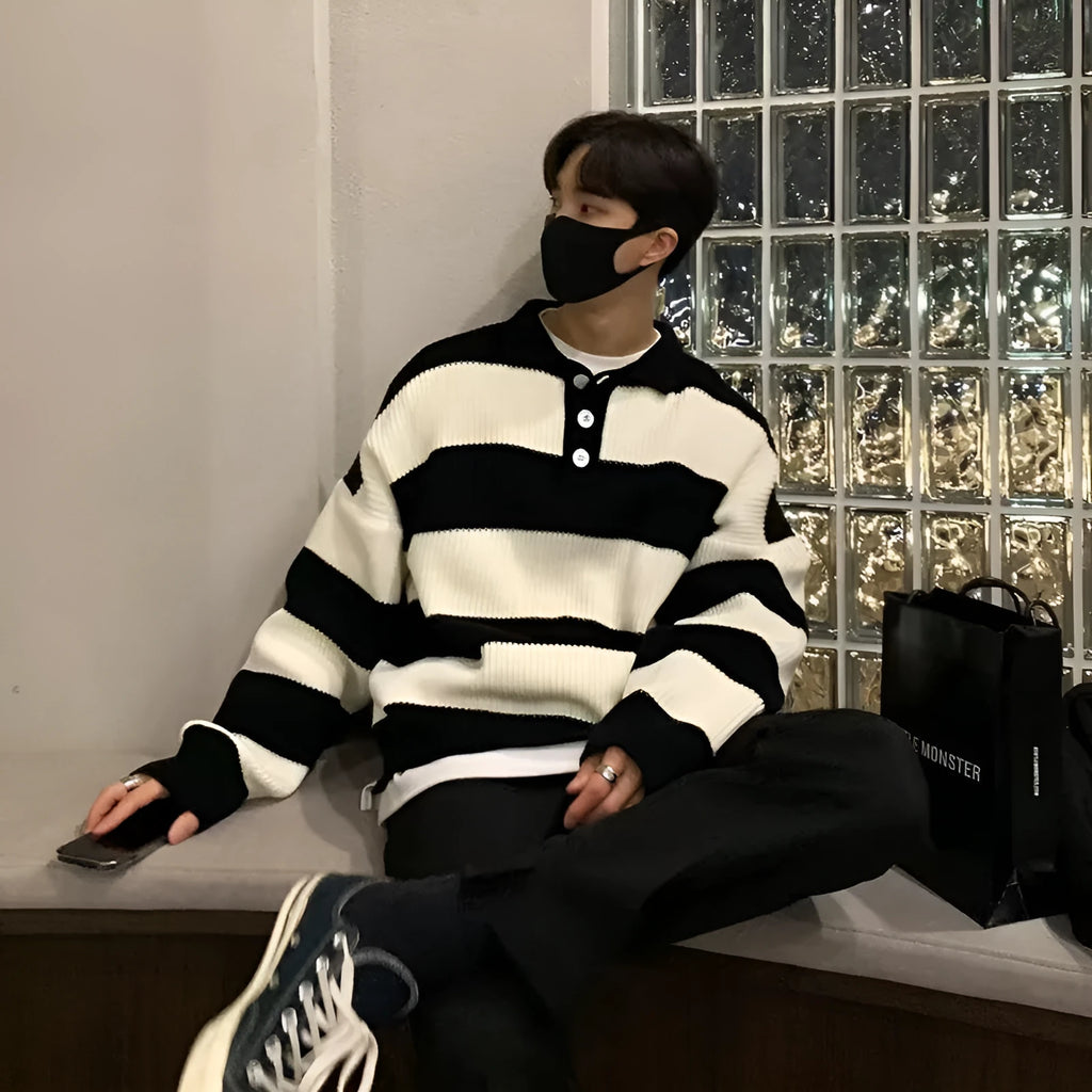 Men's loose striped sweater coat in black and grey colours with pullover design