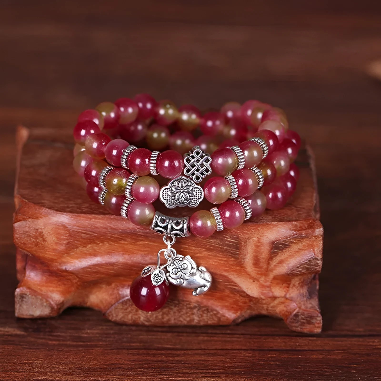 Handmade watermelon crystal bracelet with Chinese knot and geometric beads in 6mm or 8mm sizes.