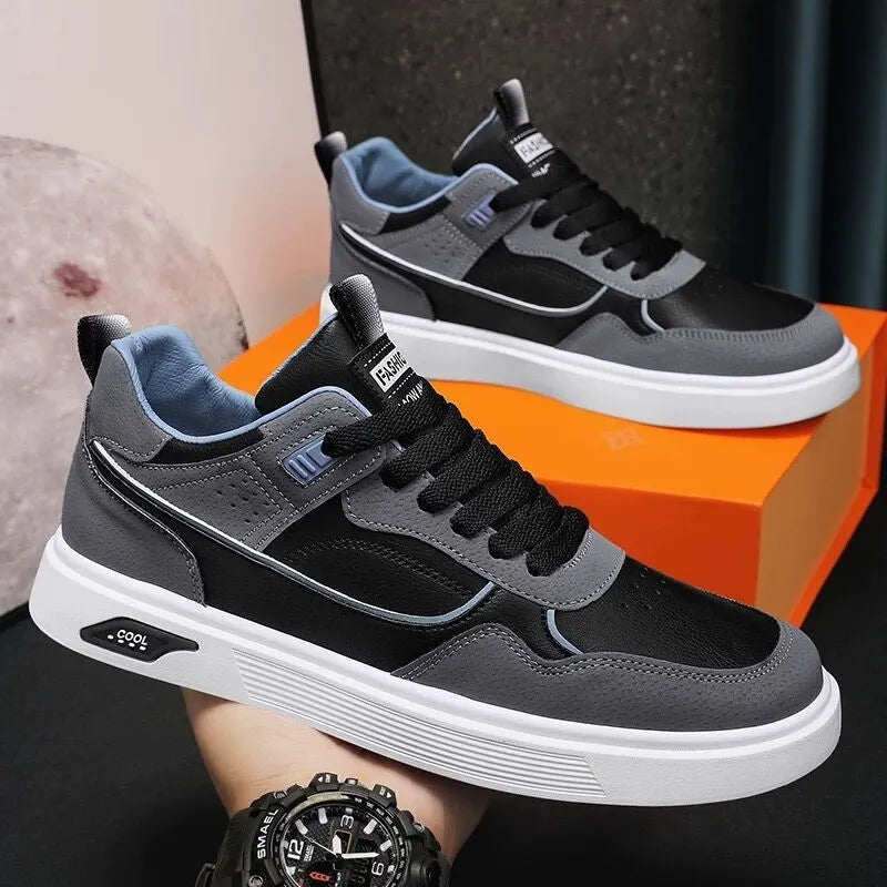 Men's low-top canvas board shoes in black, beige, and grey with mesh lining and leather stitching.