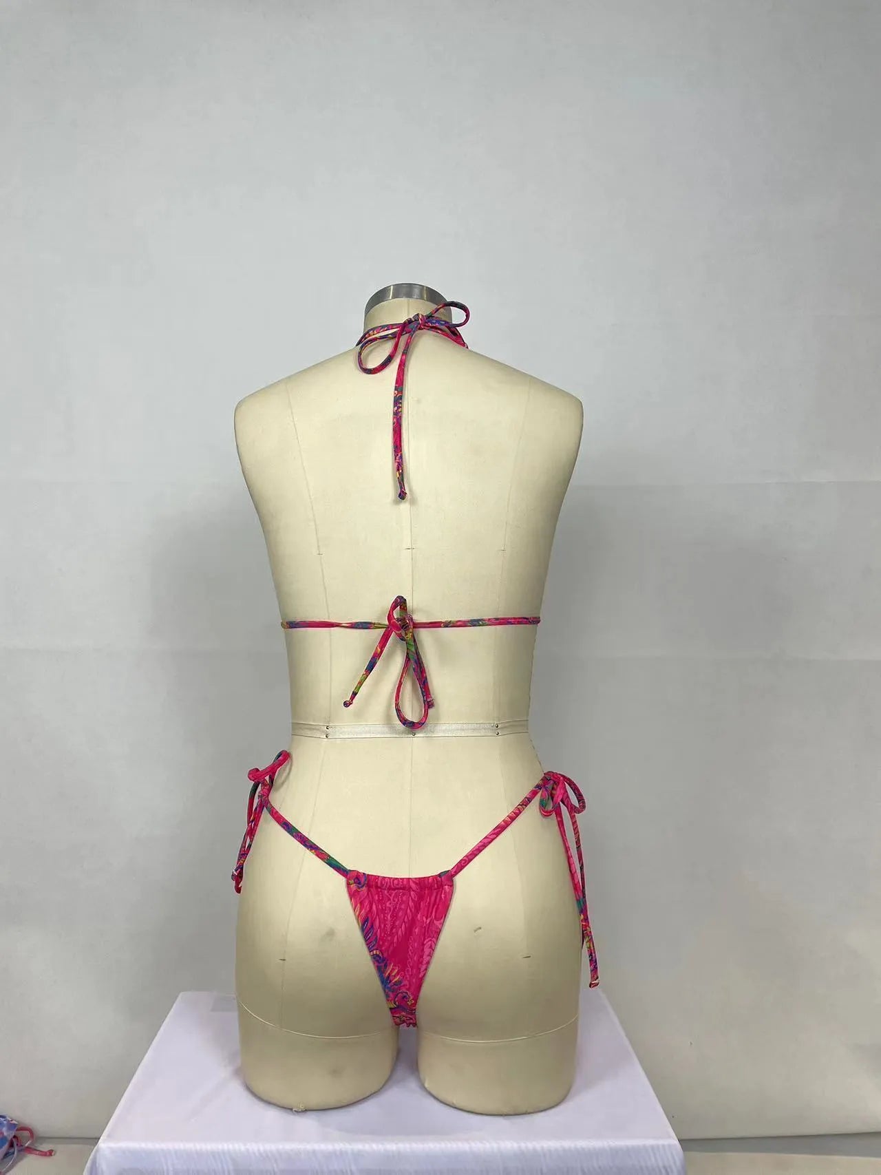 Pink women's nylon bikini two-piece swimsuit set with multiple style options for swimming