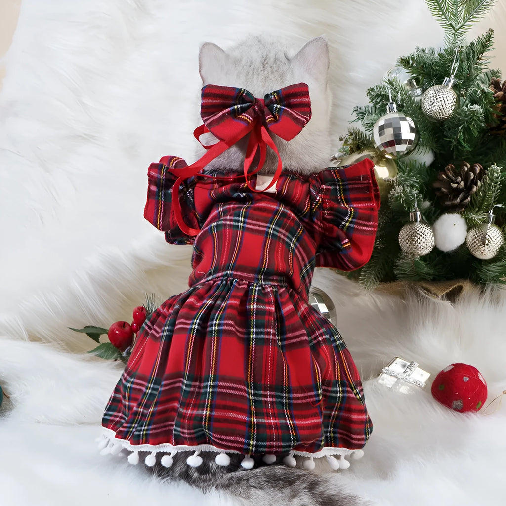 Pet wearing Christmas tartan plaid skirt with matching head flower and bow tie festive costume