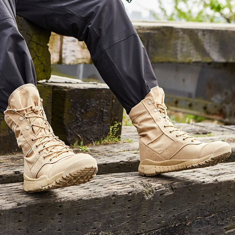 Yulong summer tactical desert combat boots in black or sand colour on an outdoor rocky terrain.