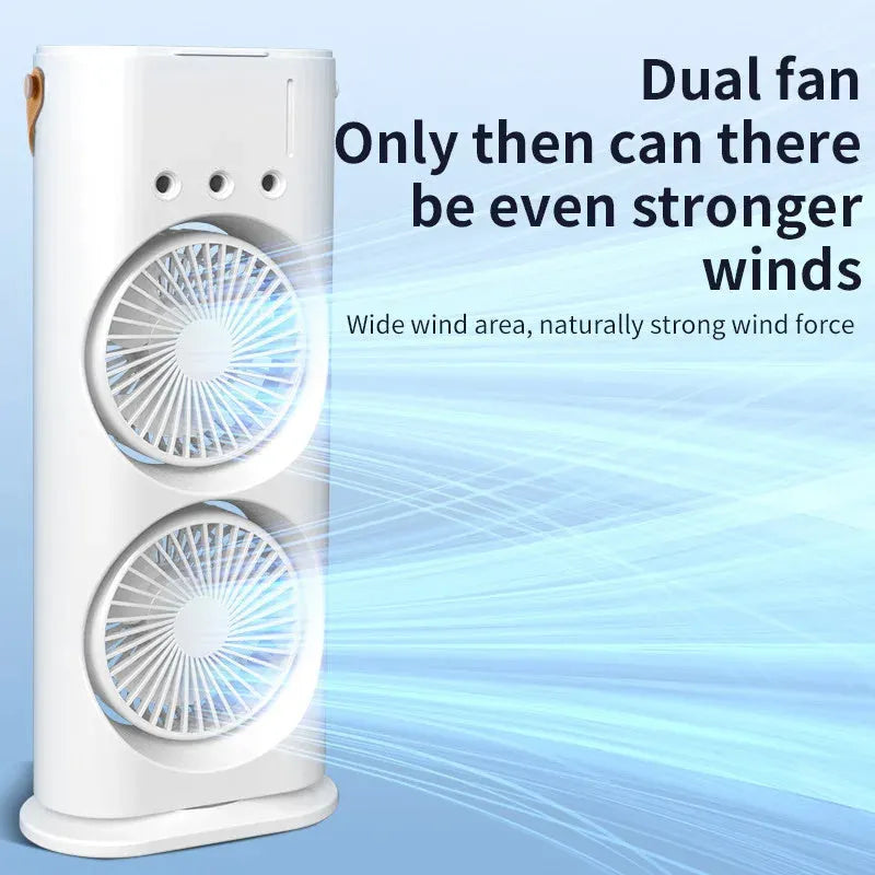 White portable humidifier fan with two spray heads, remote control, and coloured LED lights on a desk.