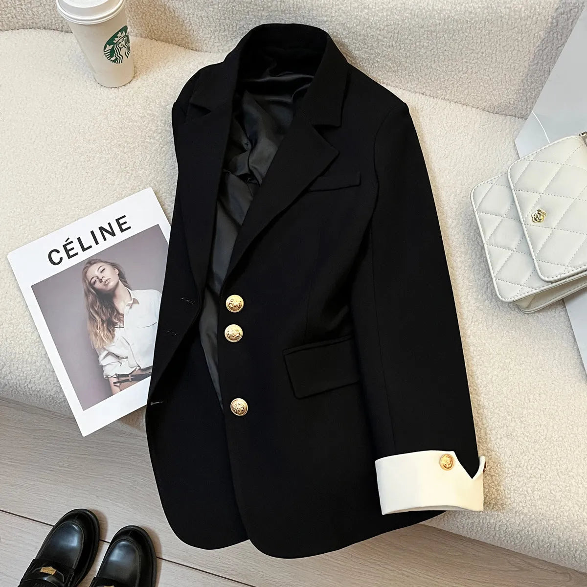 Korean style loose fit women's coat in beige and black with long sleeves and pockets.