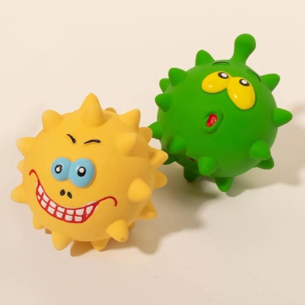 Set of four coloured squeaky dog balls with cute faces, made from natural latex rubber.