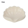 White and pink plastic shell-shaped soap dish for bathroom counter or shower