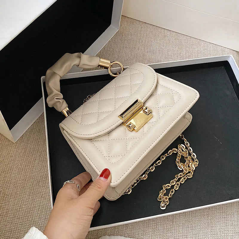 Korean-style purple PU small square shoulder bag with tapered 16-19cm width dimensions
