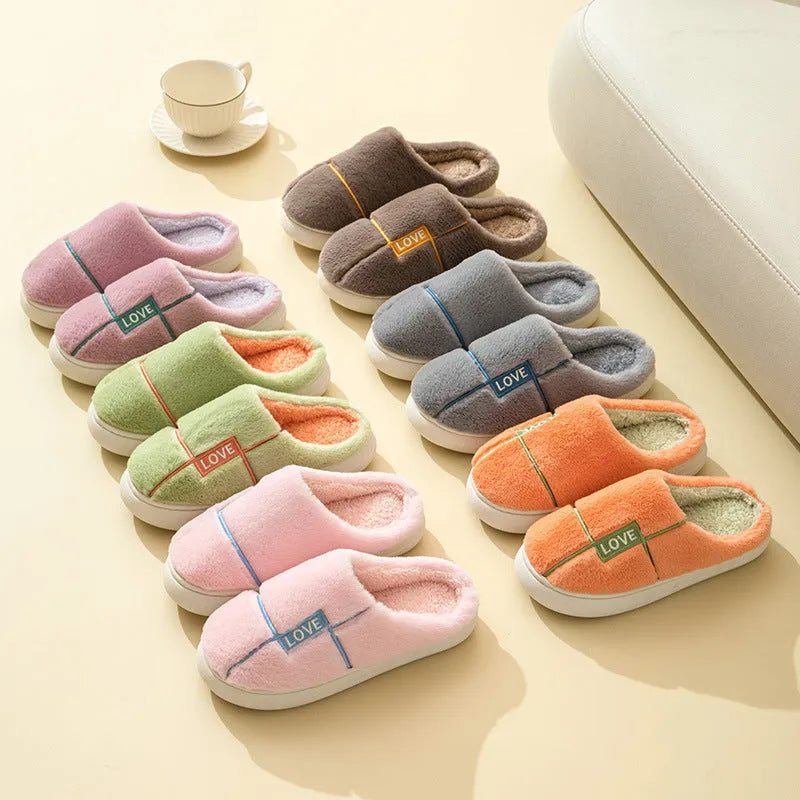 Women's furry indoor slippers in solid colour with plush upper, rubber sole, and wrapped toe, available in multiple colours