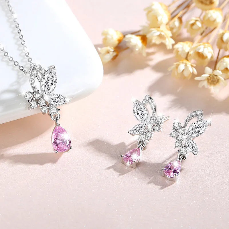 925 sterling silver butterfly stud earrings for women with purple crystal accents on a white background.