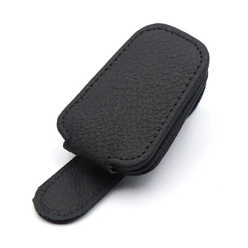 Car sunglasses clip with PU leather case attached to sun visor