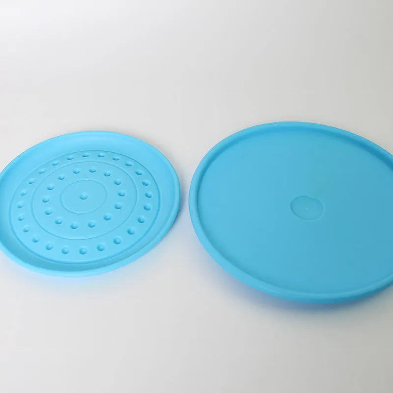 Rubber dog Frisbee toy in green large size option for outdoor fetch games with pets
