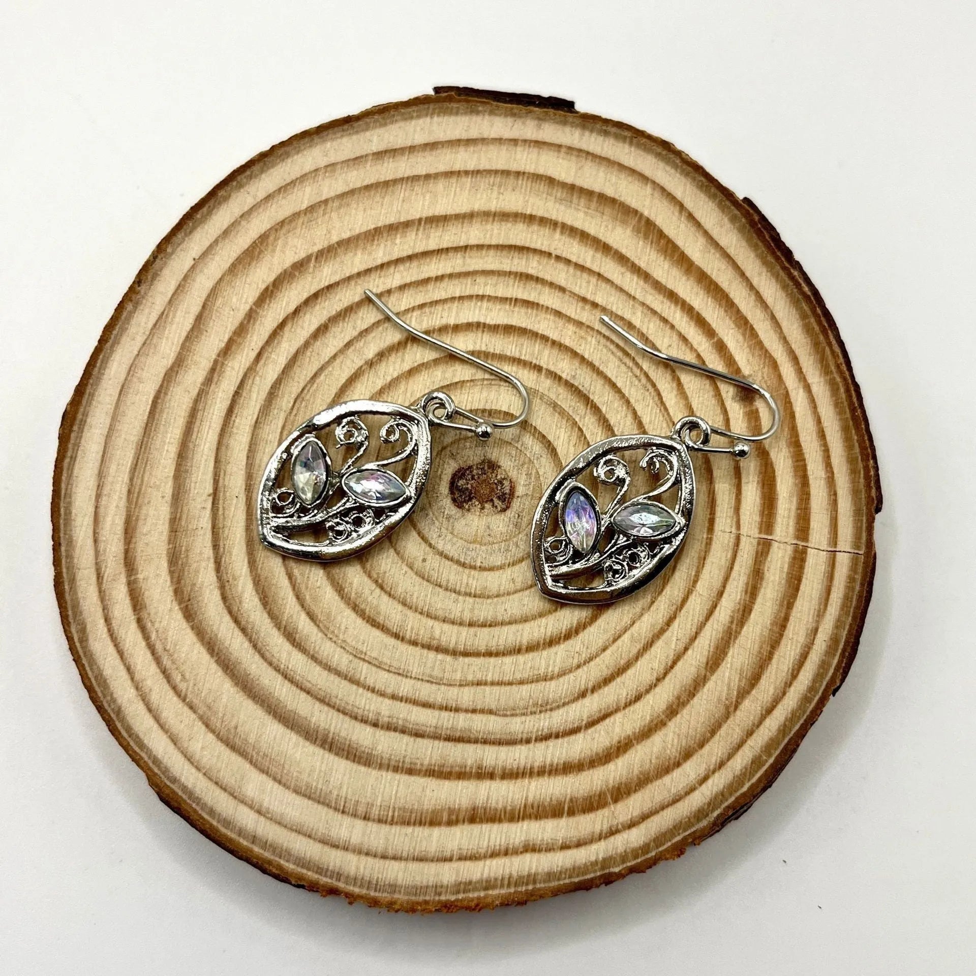 Silver leaf-shaped earrings with embedded colourful moonstones for women