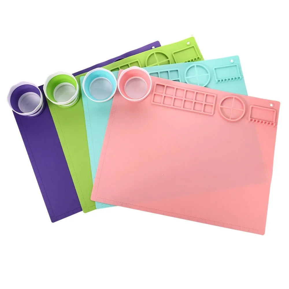 Silicone painting mat with optional mixing bowls for oil and watercolour artwork