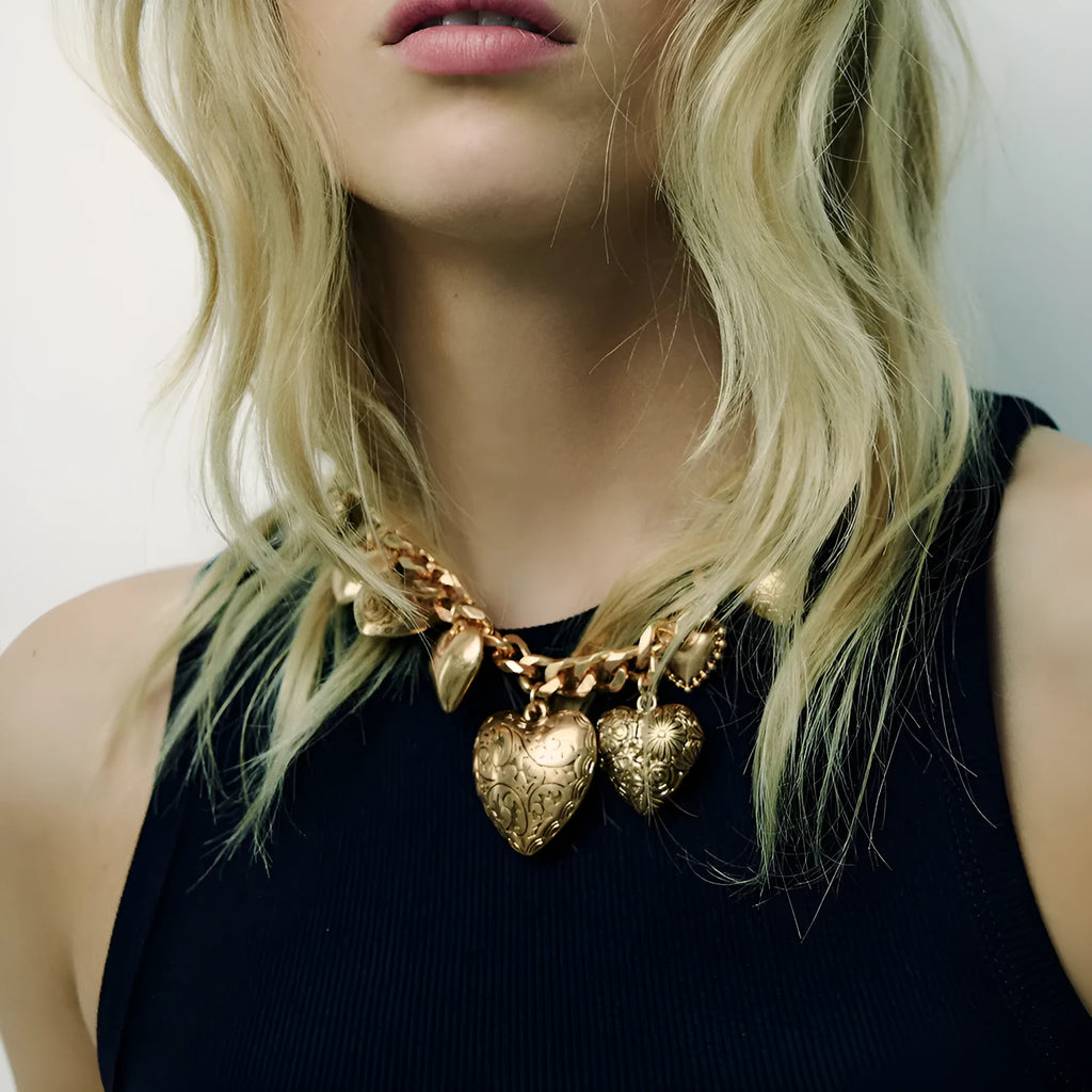 Carved heart pendant necklace with adjustable chain in gold or white K metal alloy