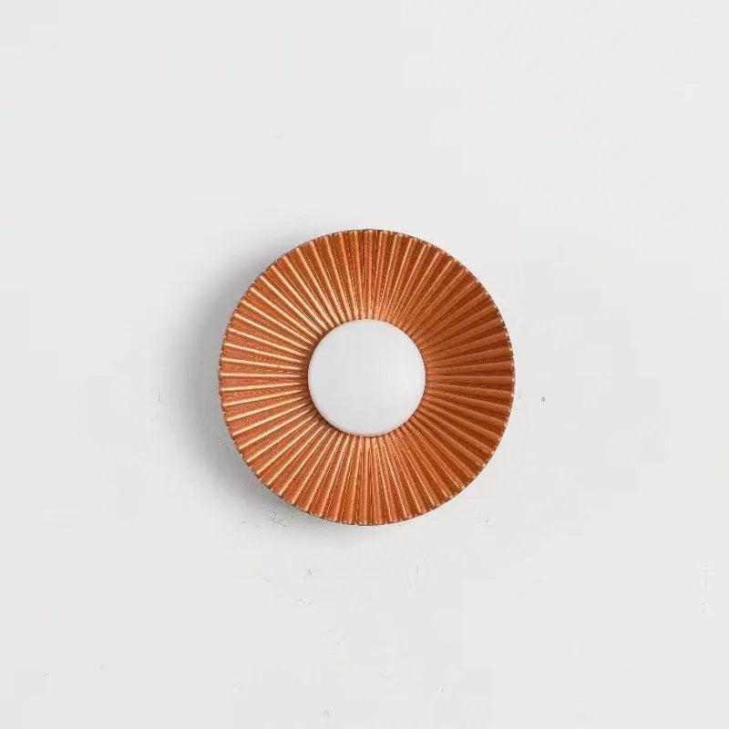 Round wall lamp with aluminium shade in gold and white two-tone finish for bedroom or living room
