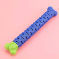 Blue-green silicone dog dental cleaning stick with serrated brush head and food crevice, 25cm long