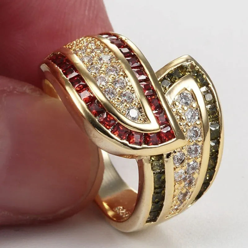 Gold-coloured peridot ring on display with alloy construction and women's sizing options