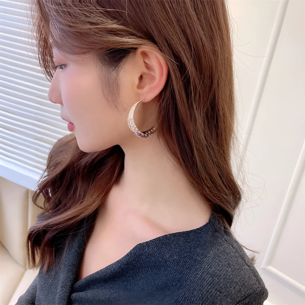 Women's large geometric copper hoop earrings with zirconium stone accents in five colour options.